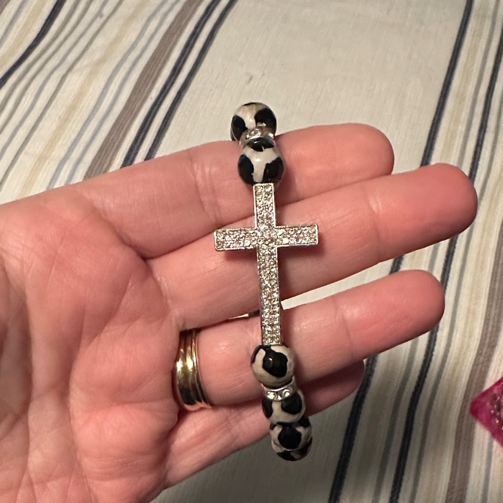 Elegant Silver Cross Bracelet with Black and White Beads